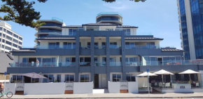 Отель Pavilion Beachfront Apartments  Маунт Маунгани